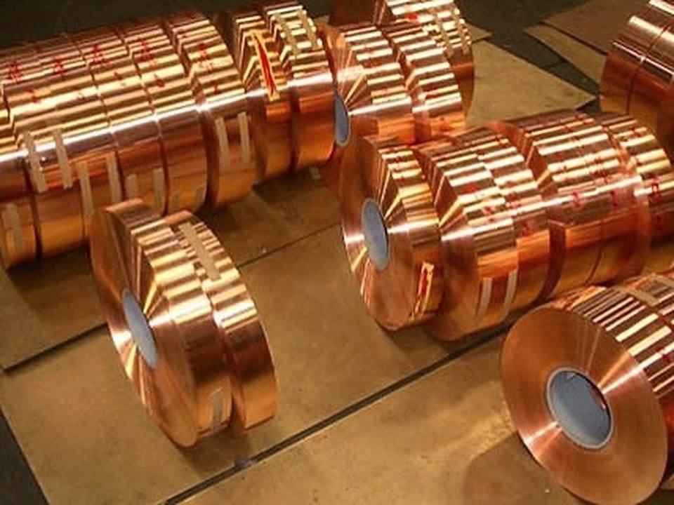 Stacked flat copper strips with clean cut edges